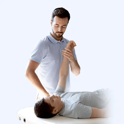 Physiotherapist treating a patient